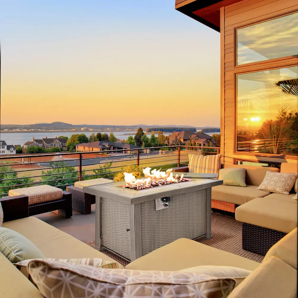 Sunset view from cozy outdoor patio with fireplace