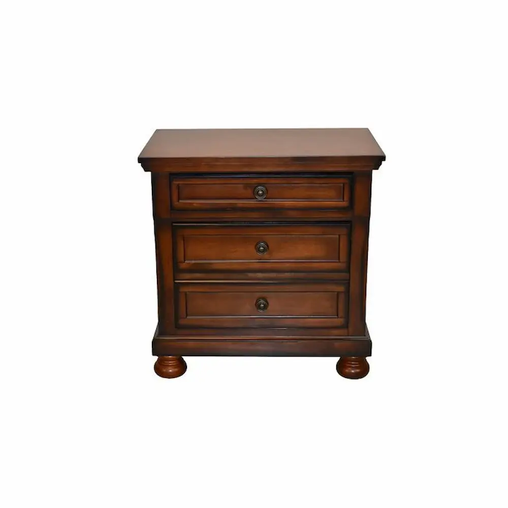 Wooden three-drawer bedside table on white background.