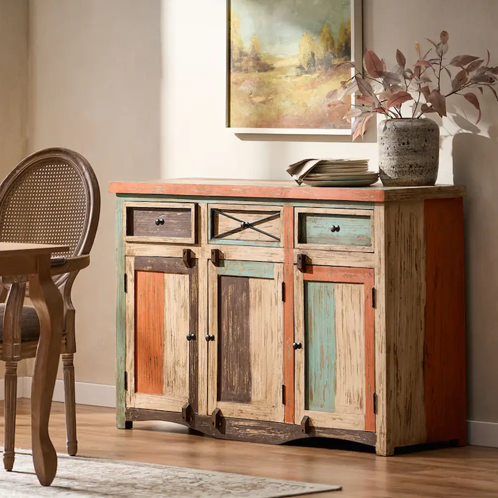 Rustic multicolored wooden sideboard in a living room.