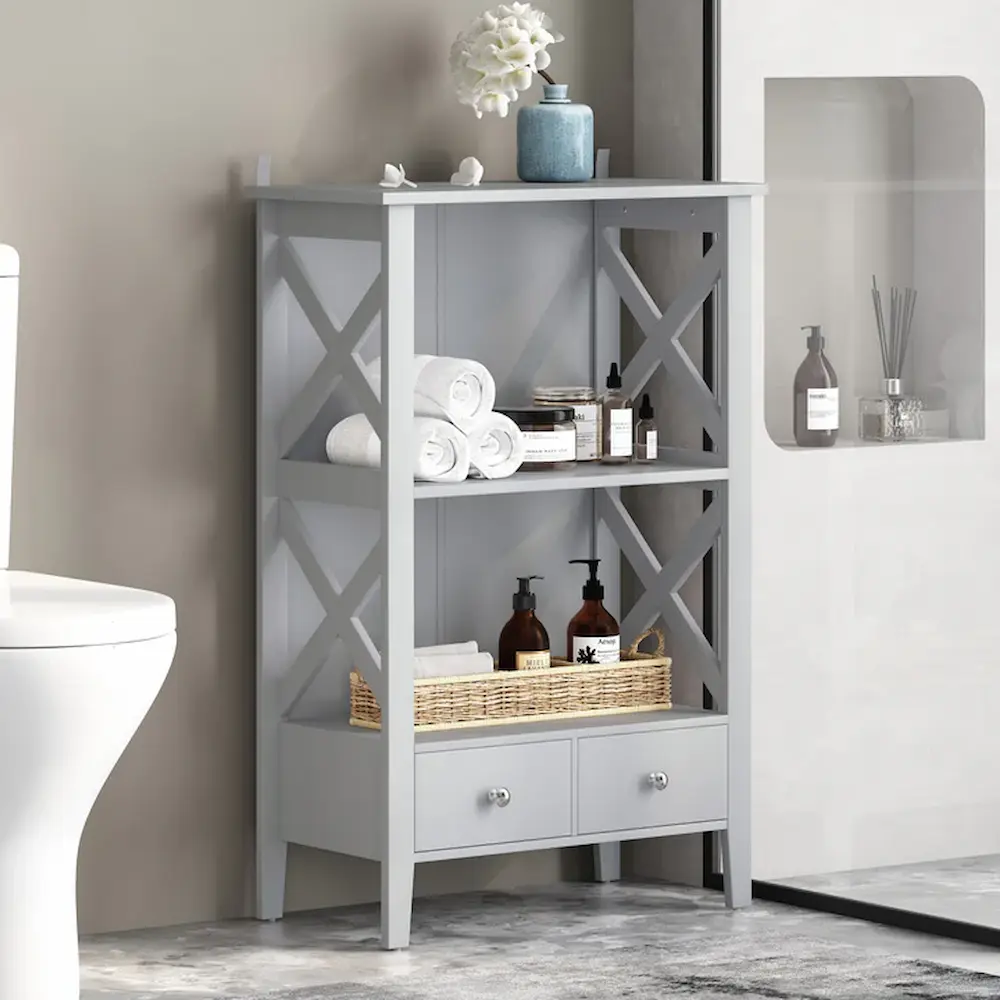 Gray bathroom shelf with towels and accessories.