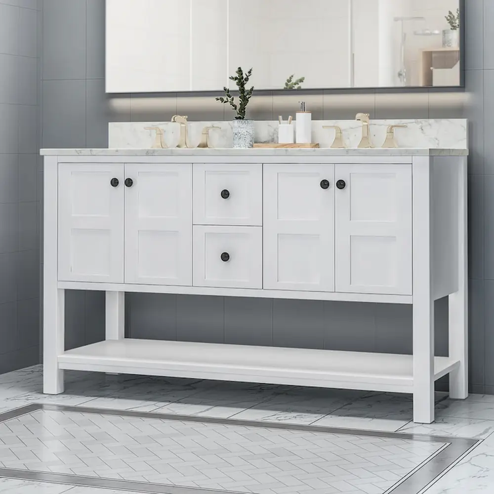 White bathroom vanity cabinet with marble top and decor.