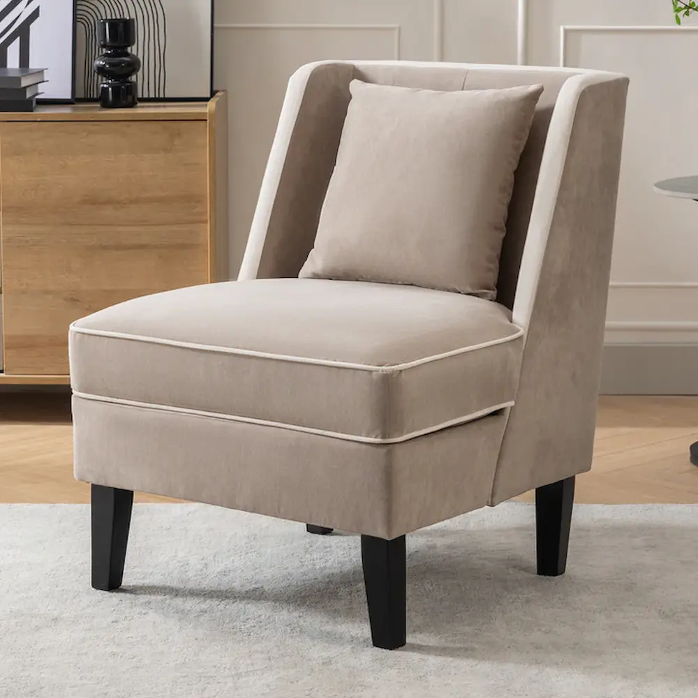 Beige modern accent chair in living room setting.